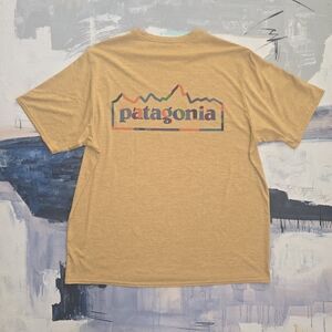 Patagonia Men's XL Capilene Cool Daily Graphic T Shirt Logo Yellow Short  Sleeve